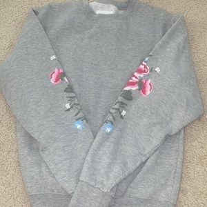 Gray sweatshirt with floral sleeves